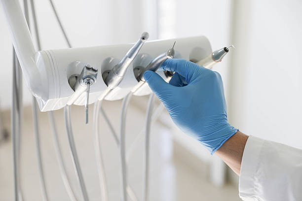Professional Invisalign Clear Aligners technician working in Four Corners, OR